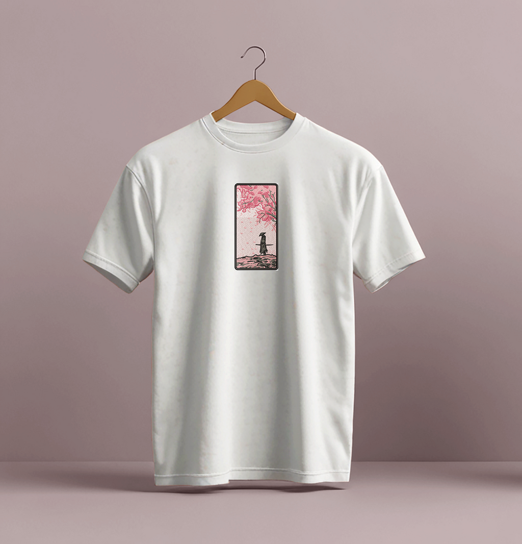 Close-up embroidery stitching detail on samurai embroidered logo t-shirt